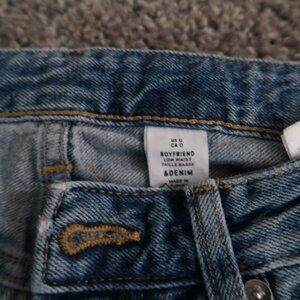 I am selling a pair of distressed boyfriend jeans